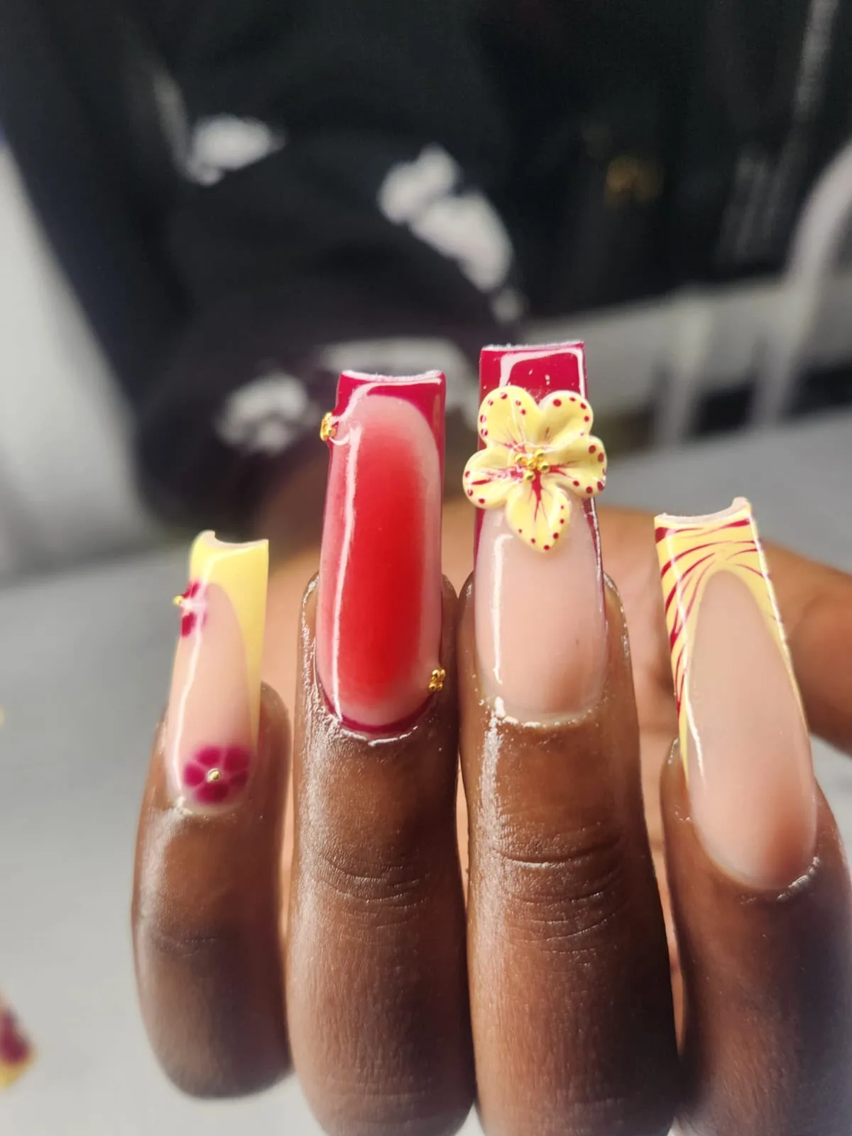 Yellow and red floral 3D nail art